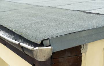 repair or replace Machroes flat roofing?